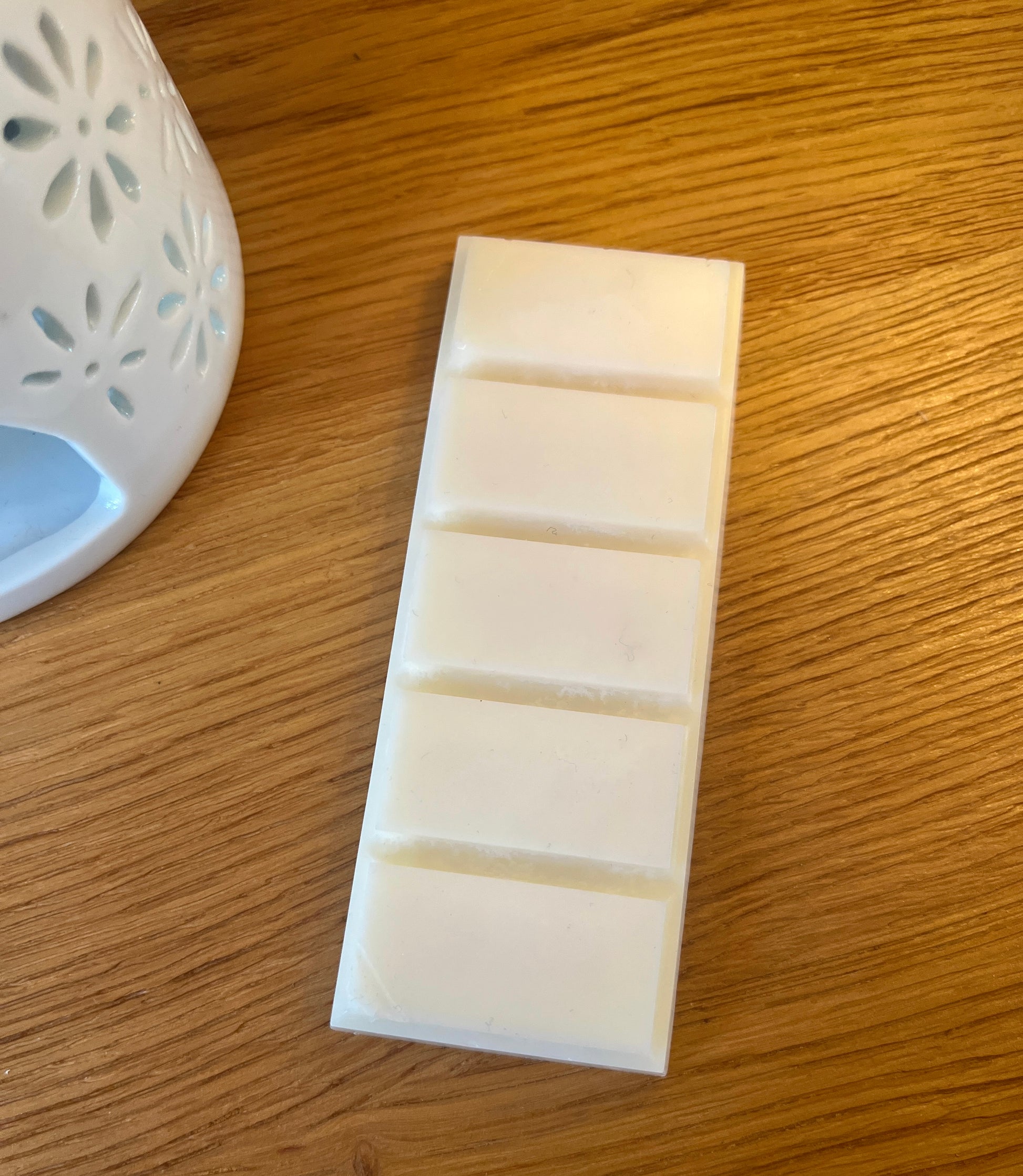 A white rectangular wax bar split into 5 sections